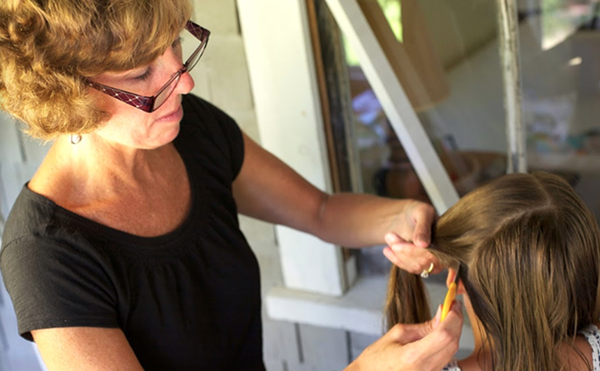 Maryellen Kumiega removing head lice
